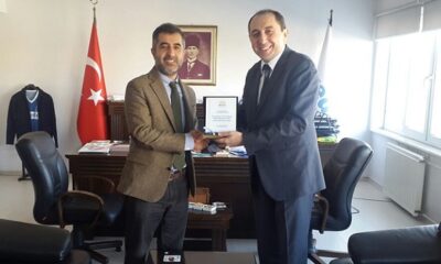 REKTÖR’DEN ALKAN’A TEŞEKKÜR PLAKETİ