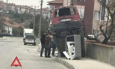 OTOMOBİL ÇÖP KONTEYNERİNİN ÜSTÜNE ÇIKTI