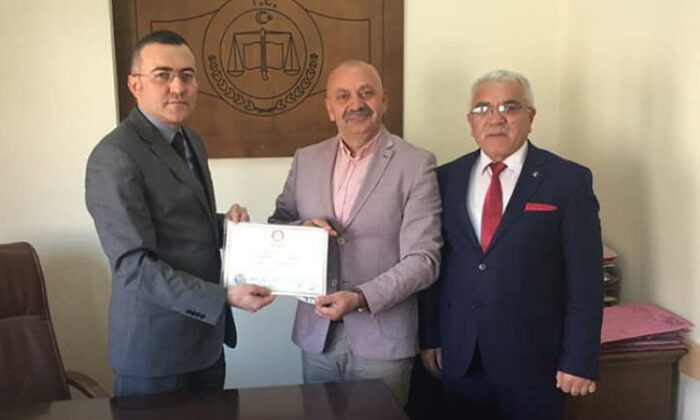 TANER İSBİR MAZBATASINI ALDI